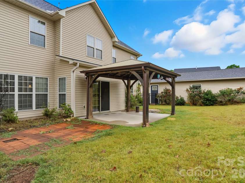 2365 Baxter Place, Concord, NC 28025.  MLS# CAR4307880, YatesRealty ID 4055. Rear view