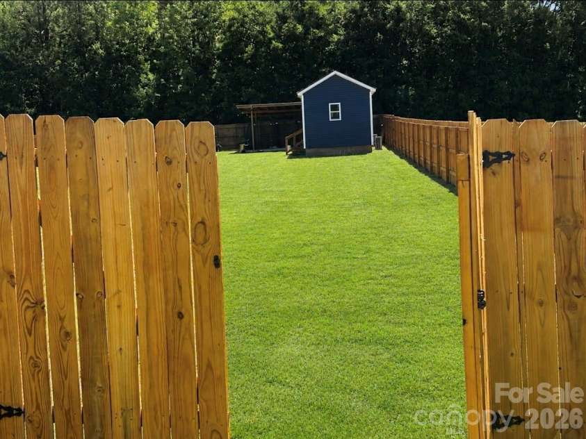 219 Sundial Drive, Lexington, NC 27295.  MLS# CAR4383429, YatesRealty ID 40551. Fenced back yard
