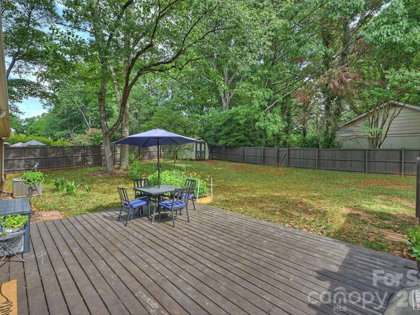 9301 Hinson Drive, Matthews, NC 28105.  MLS# CAR4405701, YatesRealty ID 40553. Amazing Deck!