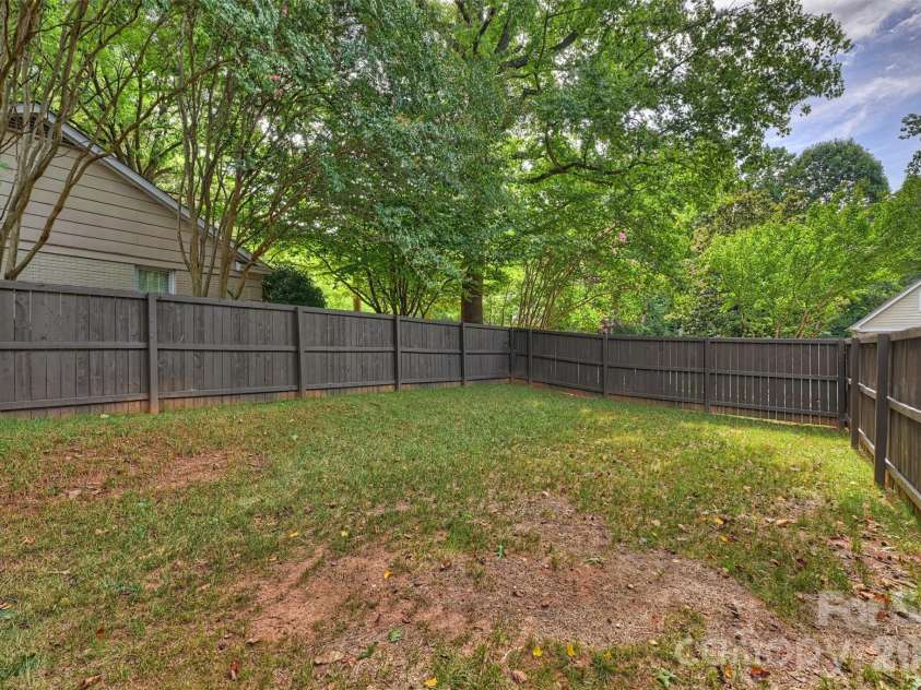 9301 Hinson Drive, Matthews, NC 28105.  MLS# CAR4405701, YatesRealty ID 40553. Privacy abounds!