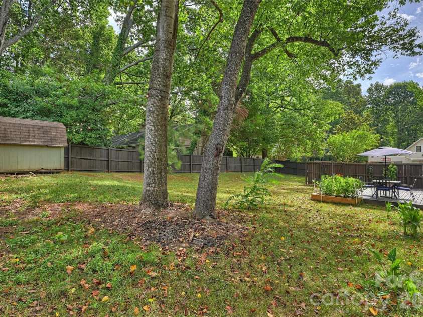 9301 Hinson Drive, Matthews, NC 28105.  MLS# CAR4405701, YatesRealty ID 40553. Private yard