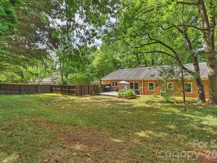 9301 Hinson Drive, Matthews, NC 28105.  MLS# CAR4405701, YatesRealty ID 40553. Rear view