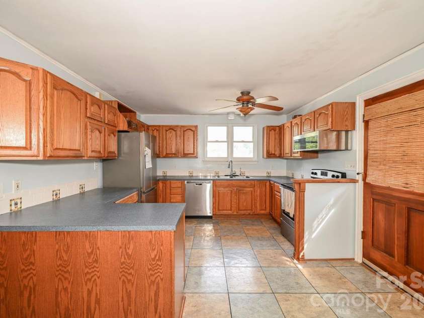 24747 Millingport Road, Locust, NC 28097.  MLS# CAR4407883, YatesRealty ID 40567. 