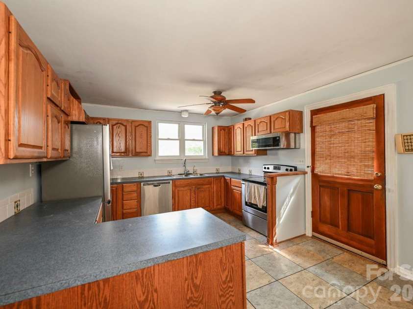 24747 Millingport Road, Locust, NC 28097.  MLS# CAR4407883, YatesRealty ID 40567. 