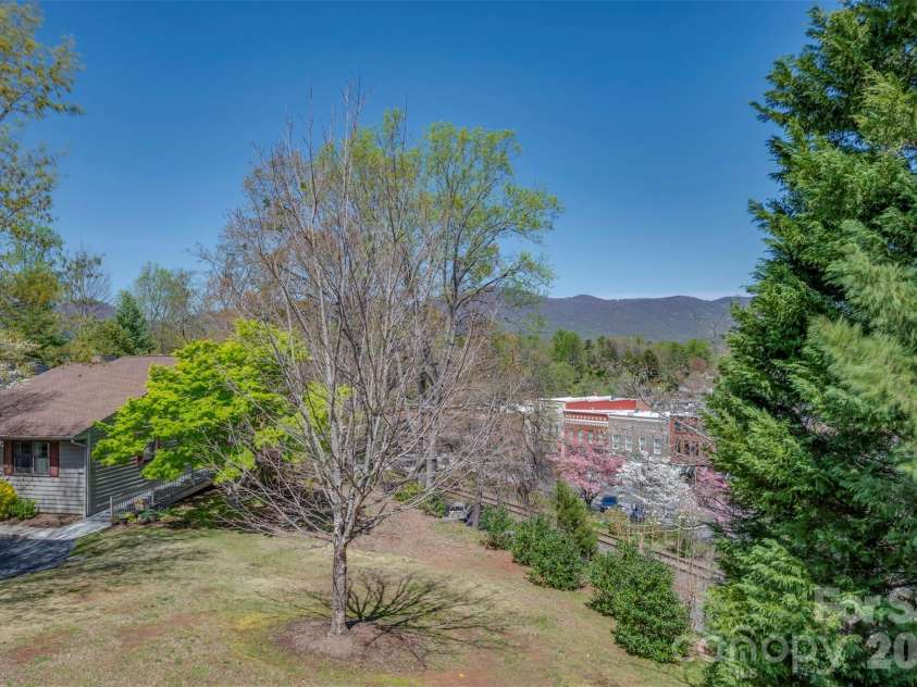 77 Chestnut Street, Tryon, NC 28782.  MLS# CAR4241972, YatesRealty ID 4057. 