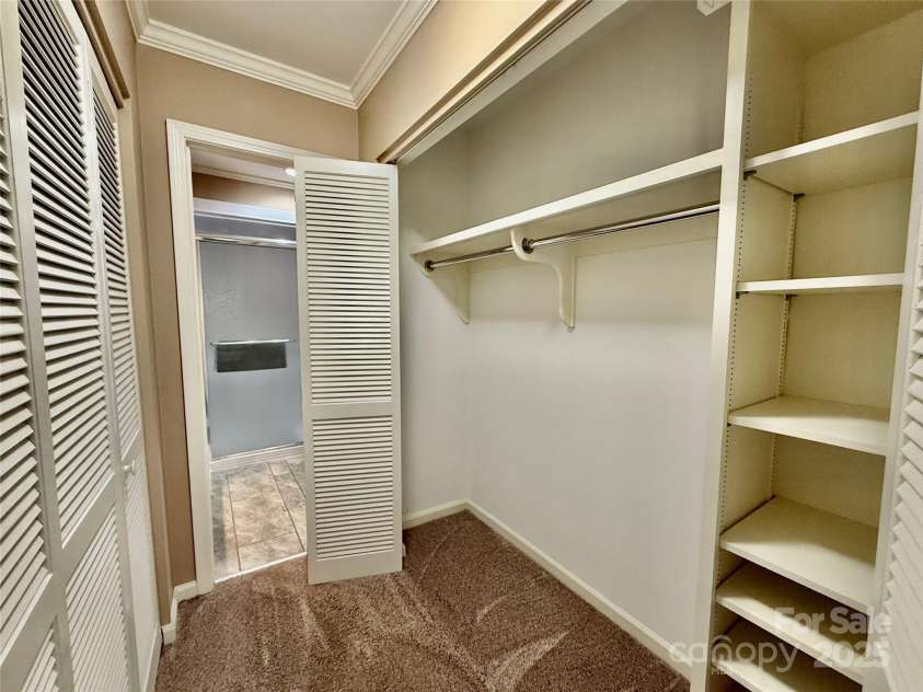 77 Chestnut Street, Tryon, NC 28782.  MLS# CAR4306733, YatesRealty ID 4057. Primary bedroom has tons of closet storage