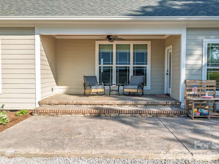 285 Jaida Lane, Oakboro, NC 28129.  MLS# CAR4408488, YatesRealty ID 40576. Back Patio
