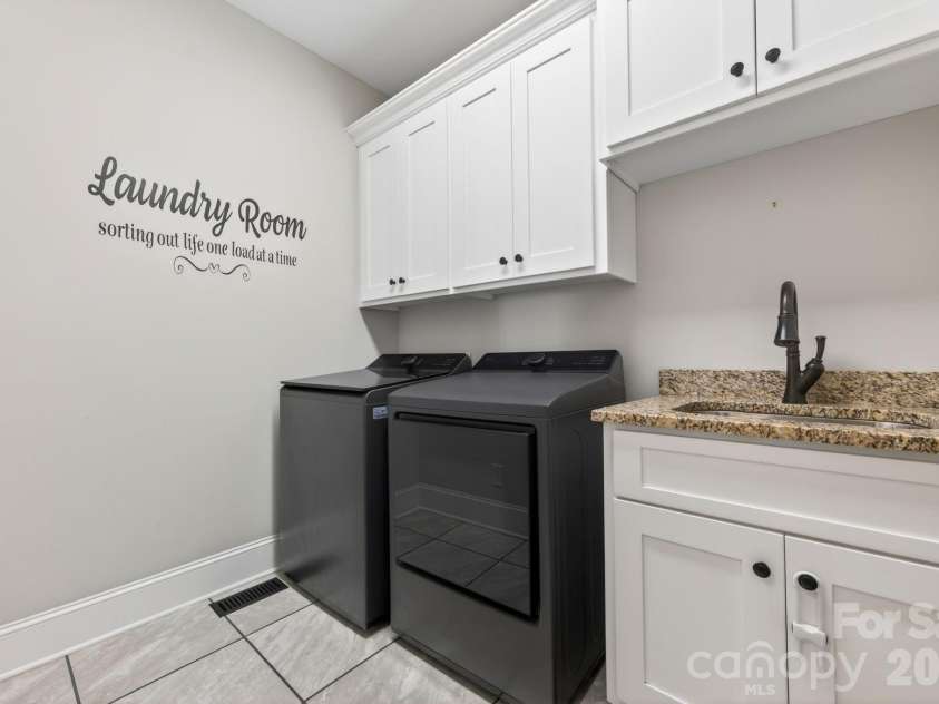 285 Jaida Lane, Oakboro, NC 28129.  MLS# CAR4408488, YatesRealty ID 40576. Laundry Room