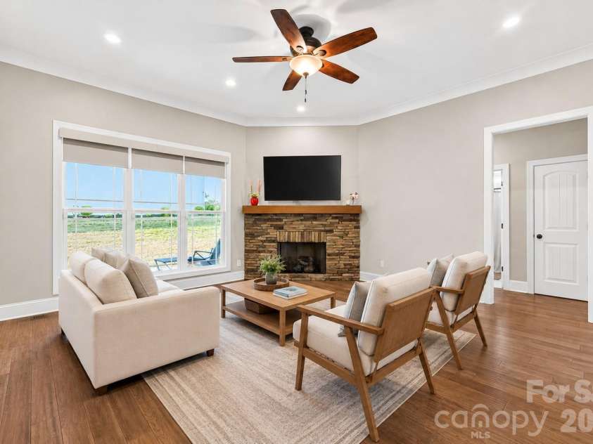 285 Jaida Lane, Oakboro, NC 28129.  MLS# CAR4408488, YatesRealty ID 40576. Living room virtually staged