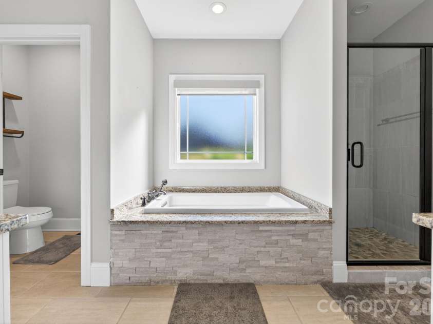 285 Jaida Lane, Oakboro, NC 28129.  MLS# CAR4408488, YatesRealty ID 40576. Primary Bathroom