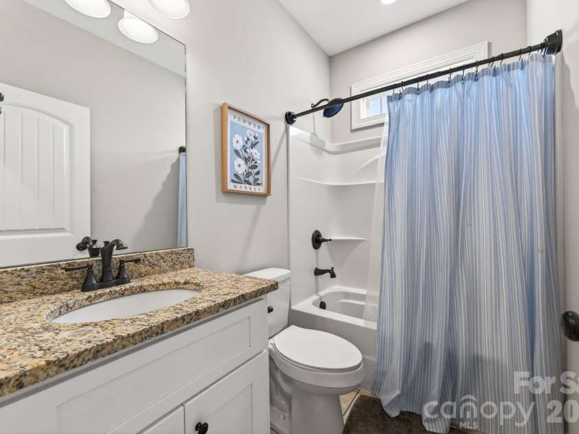 285 Jaida Lane, Oakboro, NC 28129.  MLS# CAR4408488, YatesRealty ID 40576. Second bathroom