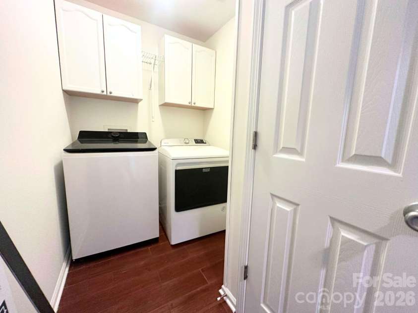 9310 Chastain Walk Drive, Charlotte, NC 28216.  MLS# CAR4322341, YatesRealty ID 4058. Upstairs Laundry Room