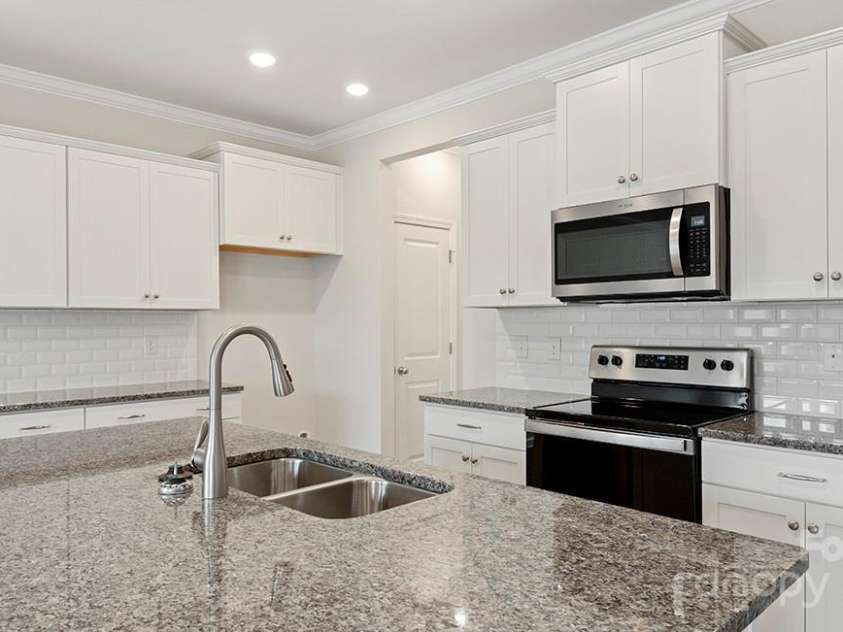 375 Creekview Road, Hendersonville, NC 28792.  MLS# CAR4328531, YatesRealty ID 4059. Photos are representative