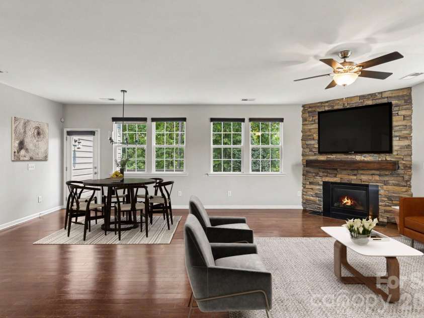 487 Moses Drive, Fort Mill, SC 29707.  MLS# CAR4409879, YatesRealty ID 40604. Virtually stage living room abd dining area