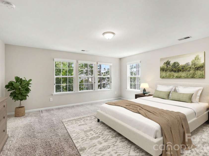 487 Moses Drive, Fort Mill, SC 29707.  MLS# CAR4409879, YatesRealty ID 40604. Virtually staged Primary suite