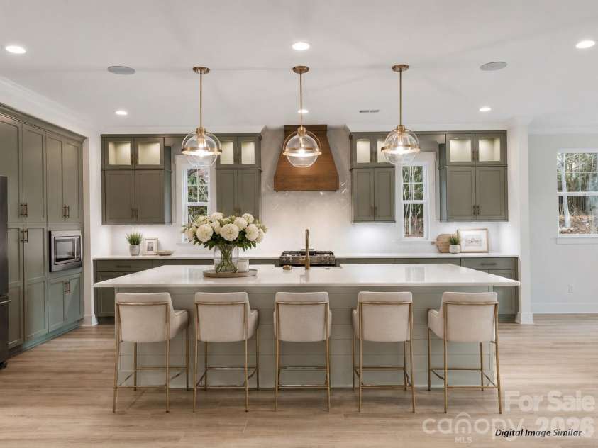 2804 Forest Lawn Drive, Weddington, NC 28104.  MLS# CAR4409157, YatesRealty ID 40618. Chef's Kitchen with Island that seats 6