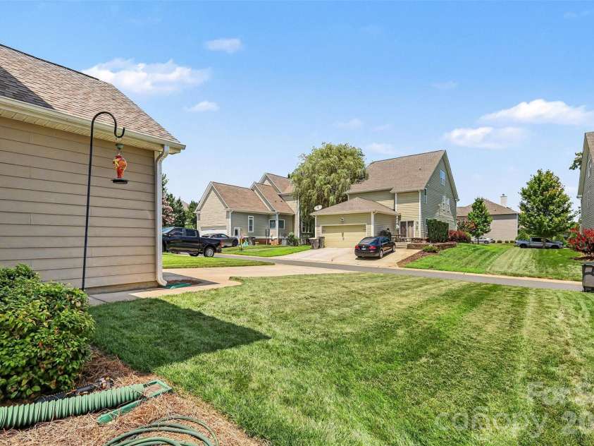 3246 Lock Erne Avenue, Kannapolis, NC 28081.  MLS# CAR4408977, YatesRealty ID 40624. Green space in back yard.  Fences are allowed.