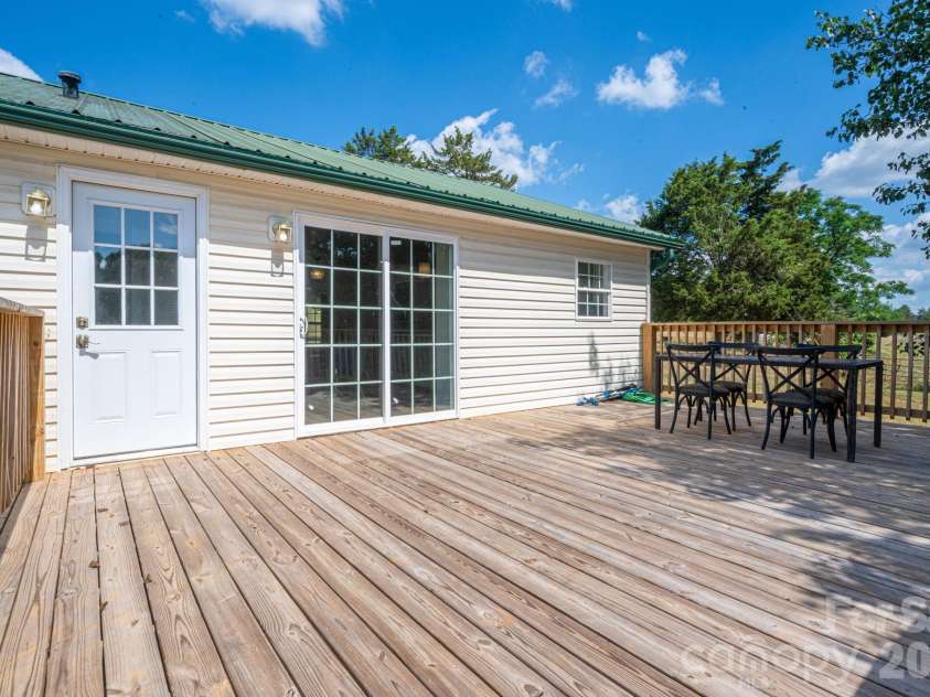 1130 Howards Creek Mill Road, Vale, NC 28168.  MLS# CAR4408725, YatesRealty ID 40631. Back deck