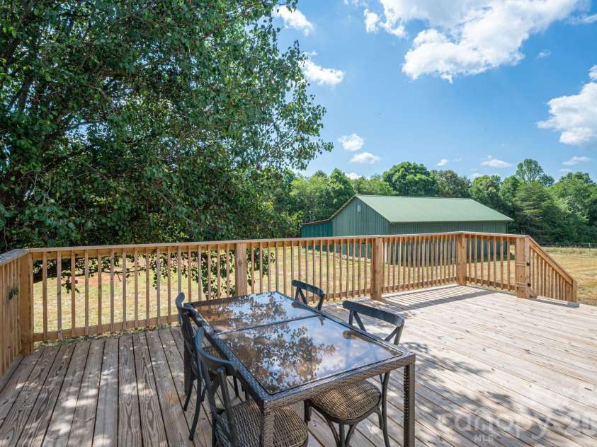 1130 Howards Creek Mill Road, Vale, NC 28168.  MLS# CAR4408725, YatesRealty ID 40631. Back deck