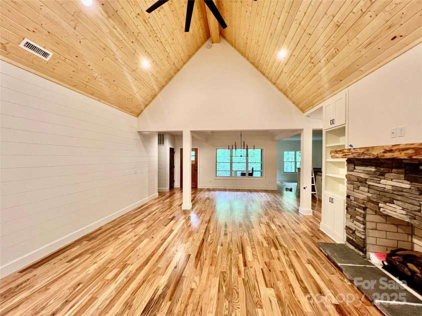 435 Soquili Drive, Brevard, NC 28712.  MLS# CAR4255595, YatesRealty ID 4064. Beautiful Fireplace and Wood Floors
