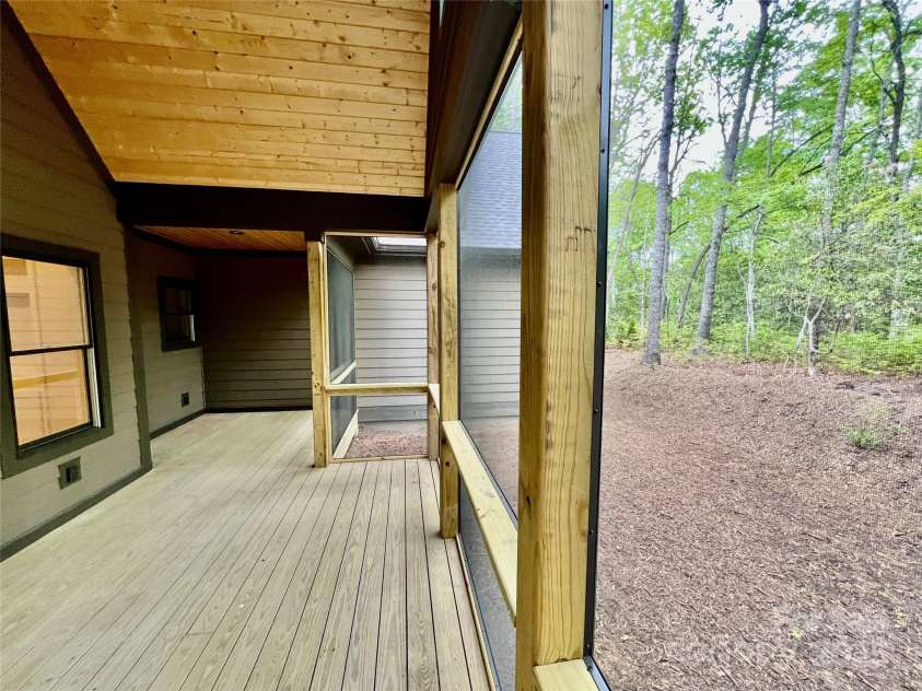 435 Soquili Drive, Brevard, NC 28712.  MLS# CAR4255595, YatesRealty ID 4064. Rear Screen Porch