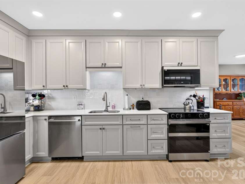 132 Parkside Lane, Mooresville, NC 28117.  MLS# CAR4407811, YatesRealty ID 40655. On The Basement Level: A 2nd Kitchen