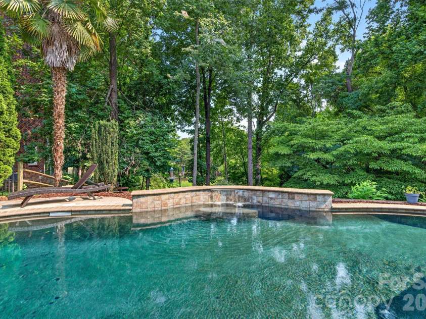 132 Parkside Lane, Mooresville, NC 28117.  MLS# CAR4407811, YatesRealty ID 40655. With A Waterfall Feature