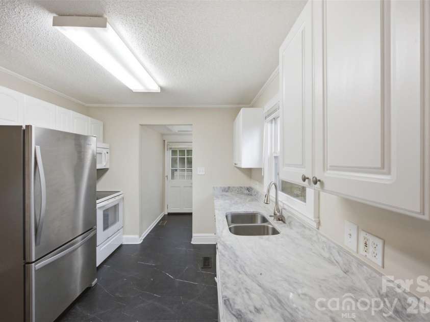 102 White Avenue, Kannapolis, NC 28081.  MLS# CAR4409366, YatesRealty ID 40657. 