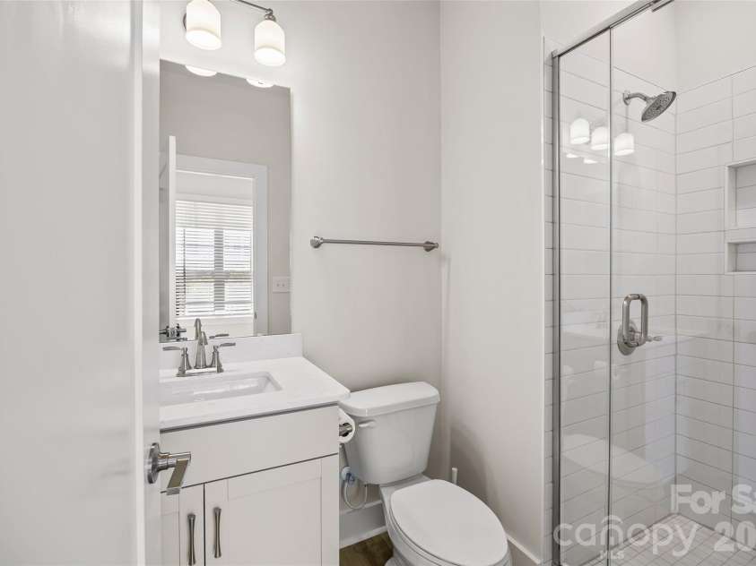 3213 Zenith Lane, Charlotte, NC 28205.  MLS# CAR4402742, YatesRealty ID 40661. Lower Bathroom