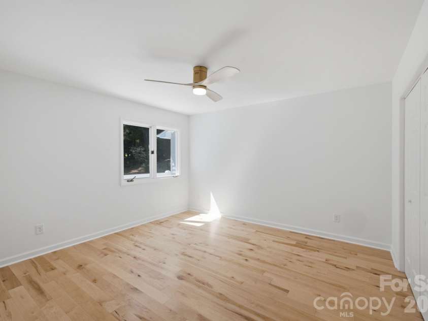 2494 Cherry Lane, Denver, NC 28037.  MLS# CAR4404242, YatesRealty ID 40664. Bright main level guest bedroom.