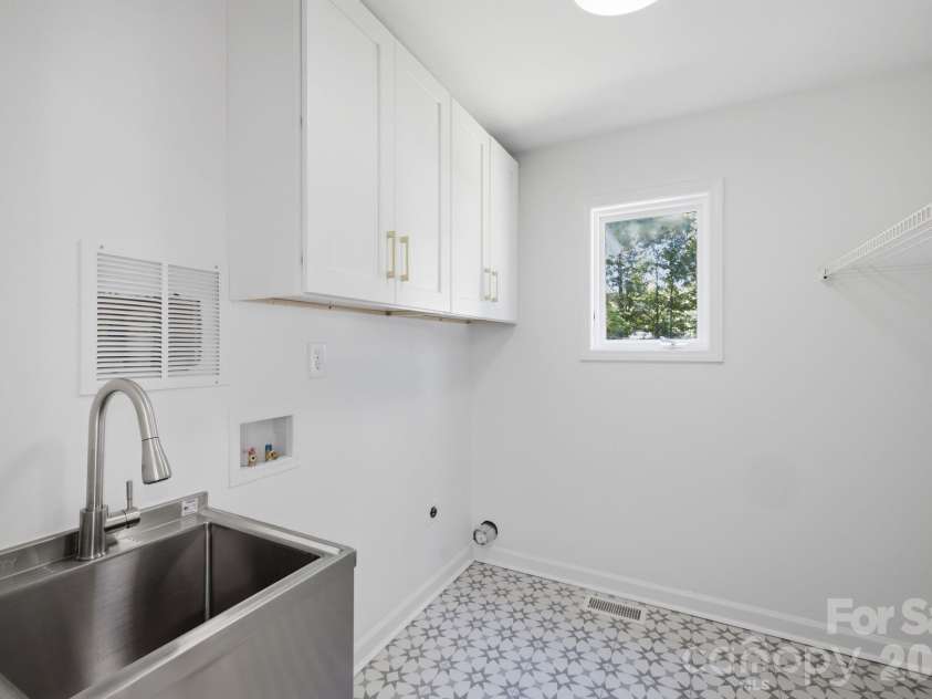 2494 Cherry Lane, Denver, NC 28037.  MLS# CAR4404242, YatesRealty ID 40664. Convenient main-level laundry room.