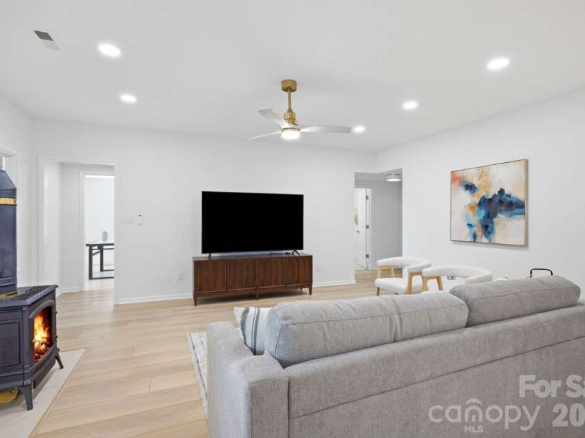 2494 Cherry Lane, Denver, NC 28037.  MLS# CAR4404242, YatesRealty ID 40664. Cozy lower level fireplace.
