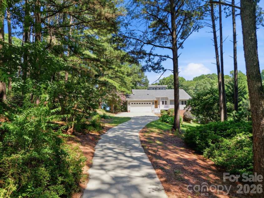 2494 Cherry Lane, Denver, NC 28037.  MLS# CAR4404242, YatesRealty ID 40664. Expansive long driveway offering privacy.