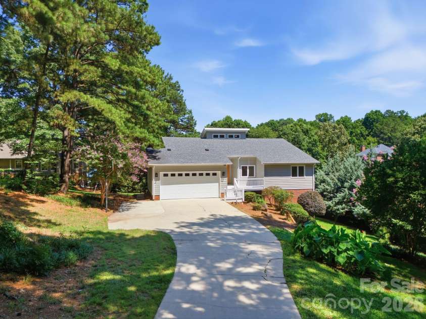 2494 Cherry Lane, Denver, NC 28037.  MLS# CAR4404242, YatesRealty ID 40664. Front aerial showcasing the home's setting.