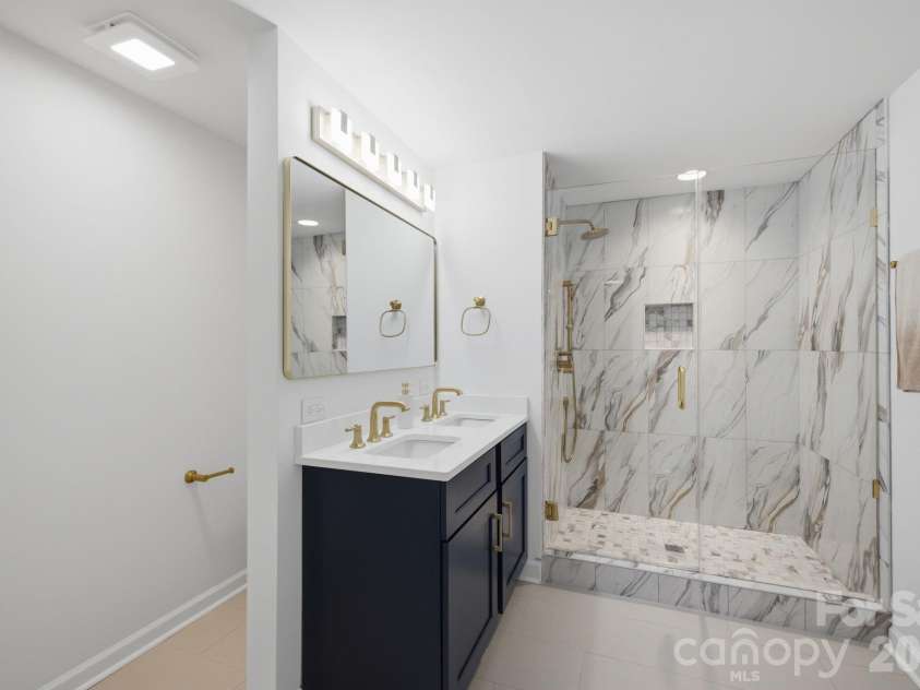 2494 Cherry Lane, Denver, NC 28037.  MLS# CAR4404242, YatesRealty ID 40664. Full lower level bathroom.