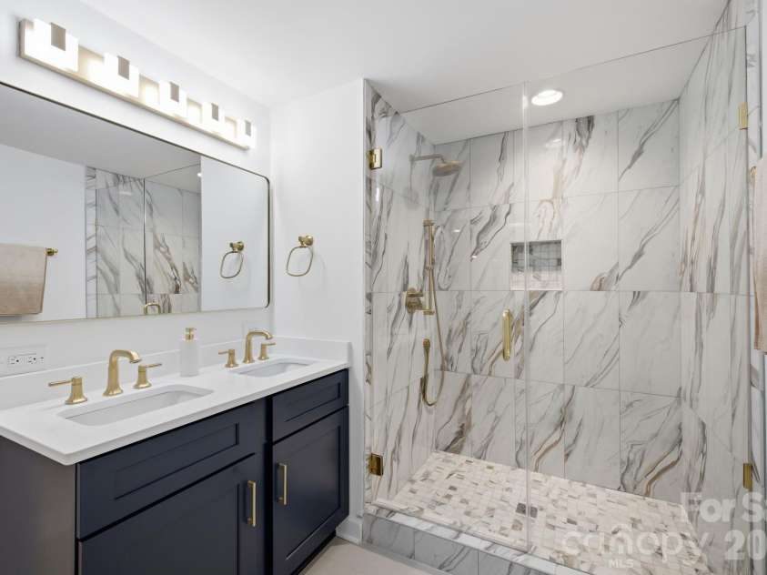2494 Cherry Lane, Denver, NC 28037.  MLS# CAR4404242, YatesRealty ID 40664. Full lower level bathroom.