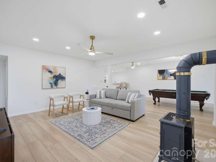 2494 Cherry Lane, Denver, NC 28037.  MLS# CAR4404242, YatesRealty ID 40664. Large lower level recreation room.
