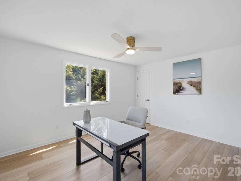 2494 Cherry Lane, Denver, NC 28037.  MLS# CAR4404242, YatesRealty ID 40664. Lower level guest suite with lake views.
