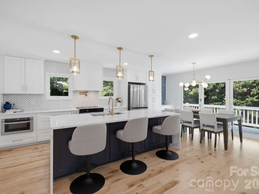 2494 Cherry Lane, Denver, NC 28037.  MLS# CAR4404242, YatesRealty ID 40664. Oversized kitchen island with seating.