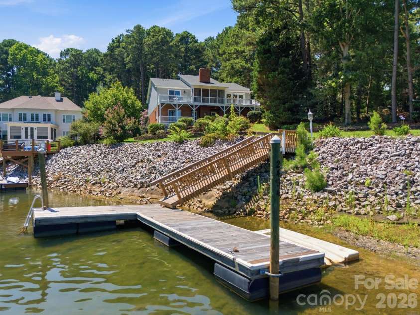 2494 Cherry Lane, Denver, NC 28037.  MLS# CAR4404242, YatesRealty ID 40664. Private dock with direct lake access.