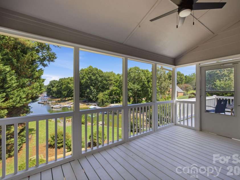 2494 Cherry Lane, Denver, NC 28037.  MLS# CAR4404242, YatesRealty ID 40664. Screened porch overlooking the water.