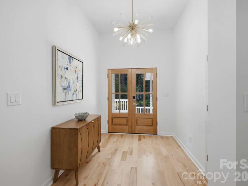 2494 Cherry Lane, Denver, NC 28037.  MLS# CAR4404242, YatesRealty ID 40664. Spacious interior hallway connecting living spaces.