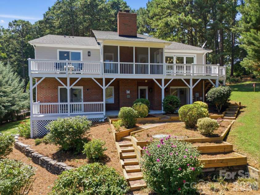 2494 Cherry Lane, Denver, NC 28037.  MLS# CAR4404242, YatesRealty ID 40664. Waterfront rear exterior overlooking Lake Norman.