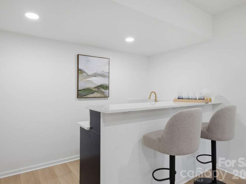 2494 Cherry Lane, Denver, NC 28037.  MLS# CAR4404242, YatesRealty ID 40664. Wet bar perfect for hosting.