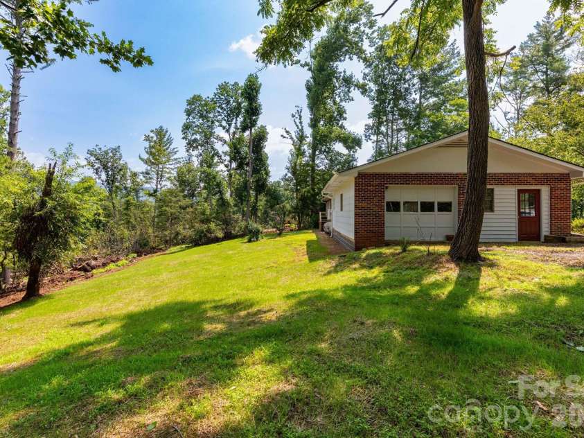 1860 Deer Park Lake Road, Spruce Pine, NC 28777.  MLS# CAR4408891, YatesRealty ID 40669. Back Yard with Views