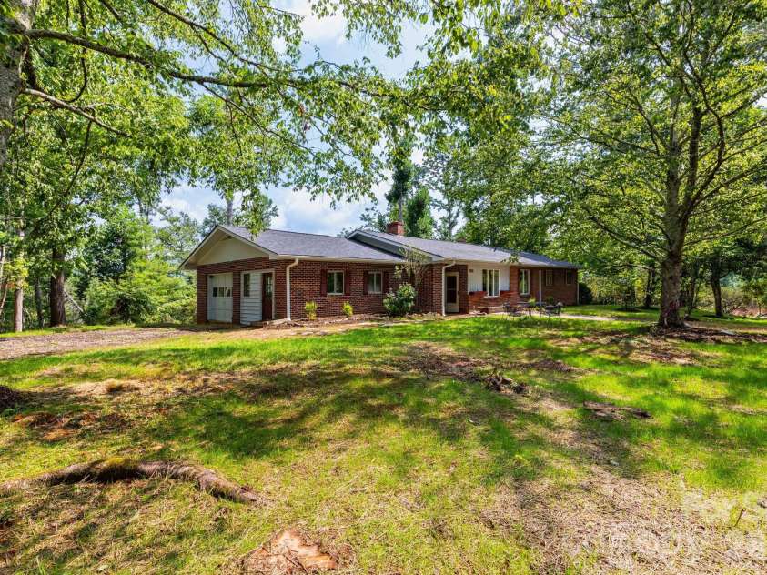 1860 Deer Park Lake Road, Spruce Pine, NC 28777.  MLS# CAR4408891, YatesRealty ID 40669. Front Yard
