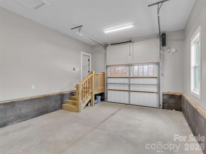 171 Peyton Elaine Road, Clyde, NC 28721.  MLS# CAR4333107, YatesRealty ID 4068. Oversized One-Car Garage with 12' Ceilings