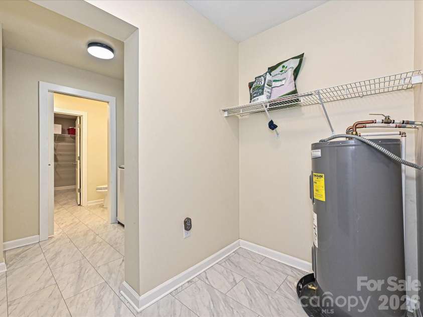 3115 Potter Road, Waxhaw, NC 28173.  MLS# CAR4406942, YatesRealty ID 40681. Located off kitchen pass thru drop zone to laundry room