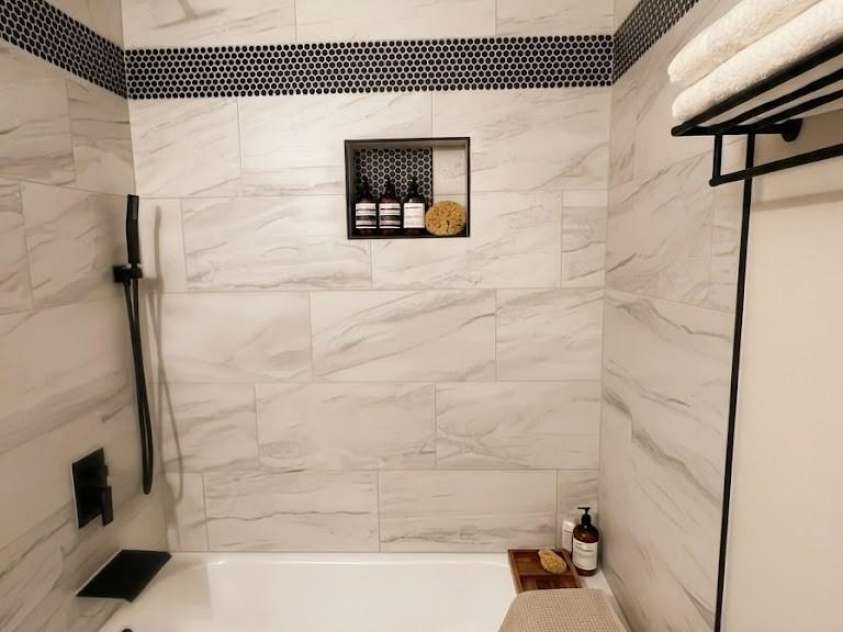 5228 Crane Point Drive, Charlotte, NC 28227.  MLS# CAR4408509, YatesRealty ID 40685. Gorgeous second bathroom with black modern decor fixtures