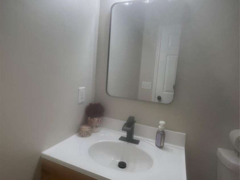 5228 Crane Point Drive, Charlotte, NC 28227.  MLS# CAR4408509, YatesRealty ID 40685. New vanity in second bathroom